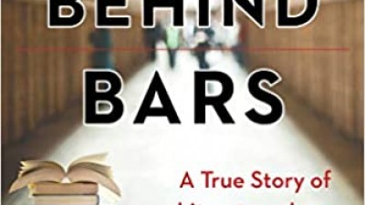 READING BEHIND BARS: A MEMOIR OF LITERATURE, LAW, AND LIFE AS A PRISON LIBRARIAN - GRUNENWALD, JILL A